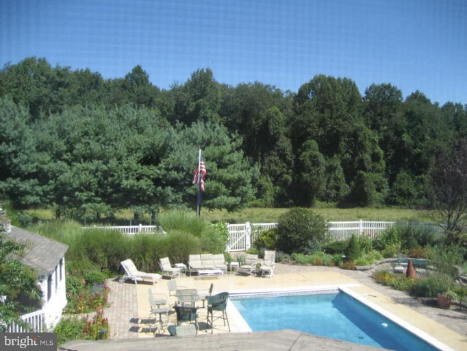 2208 Link Road Silver Spring, MD 20905 - Photo 10 of 30 a view of a lake with houses with outdoor space and lake view
