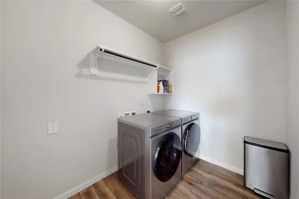 a utility room with dryer and washer