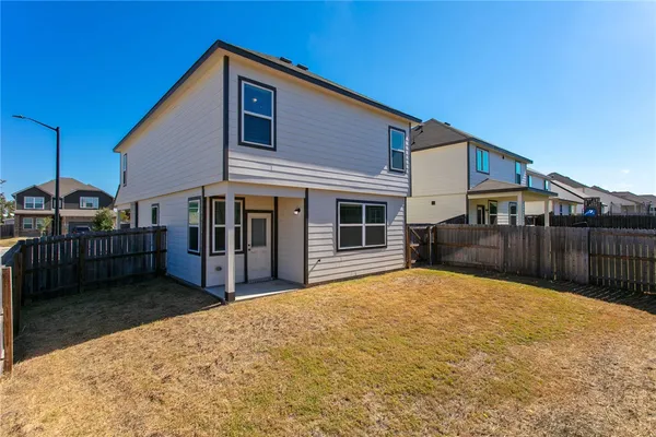 a house view with a outdoor space