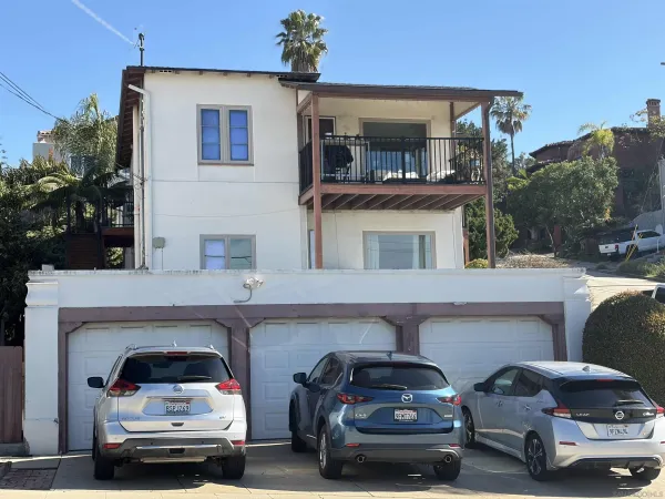 a car parked in front of a house
