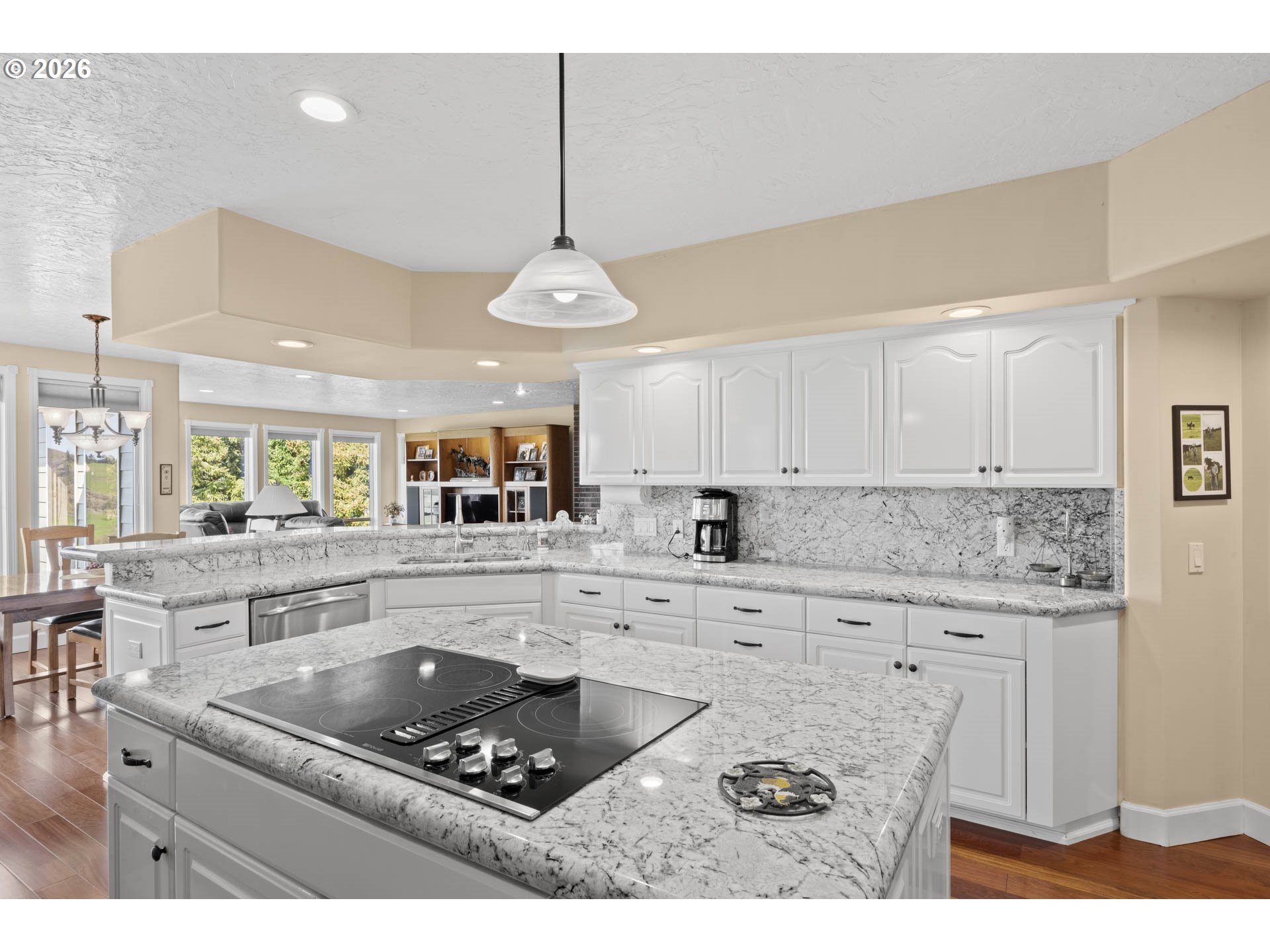 1791 Scotts Valley Road Yoncalla, OR 97499 - Photo 11 of 48 a kitchen with stainless steel appliances granite countertop a sink a stove a refrigerator cabinets and living room view