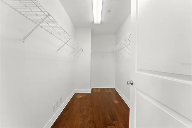 a view of a room with racks on the wall