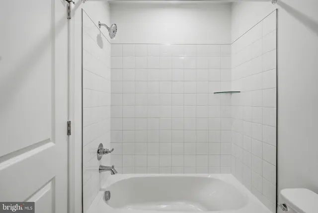 a close up of a bathtub in a bathroom