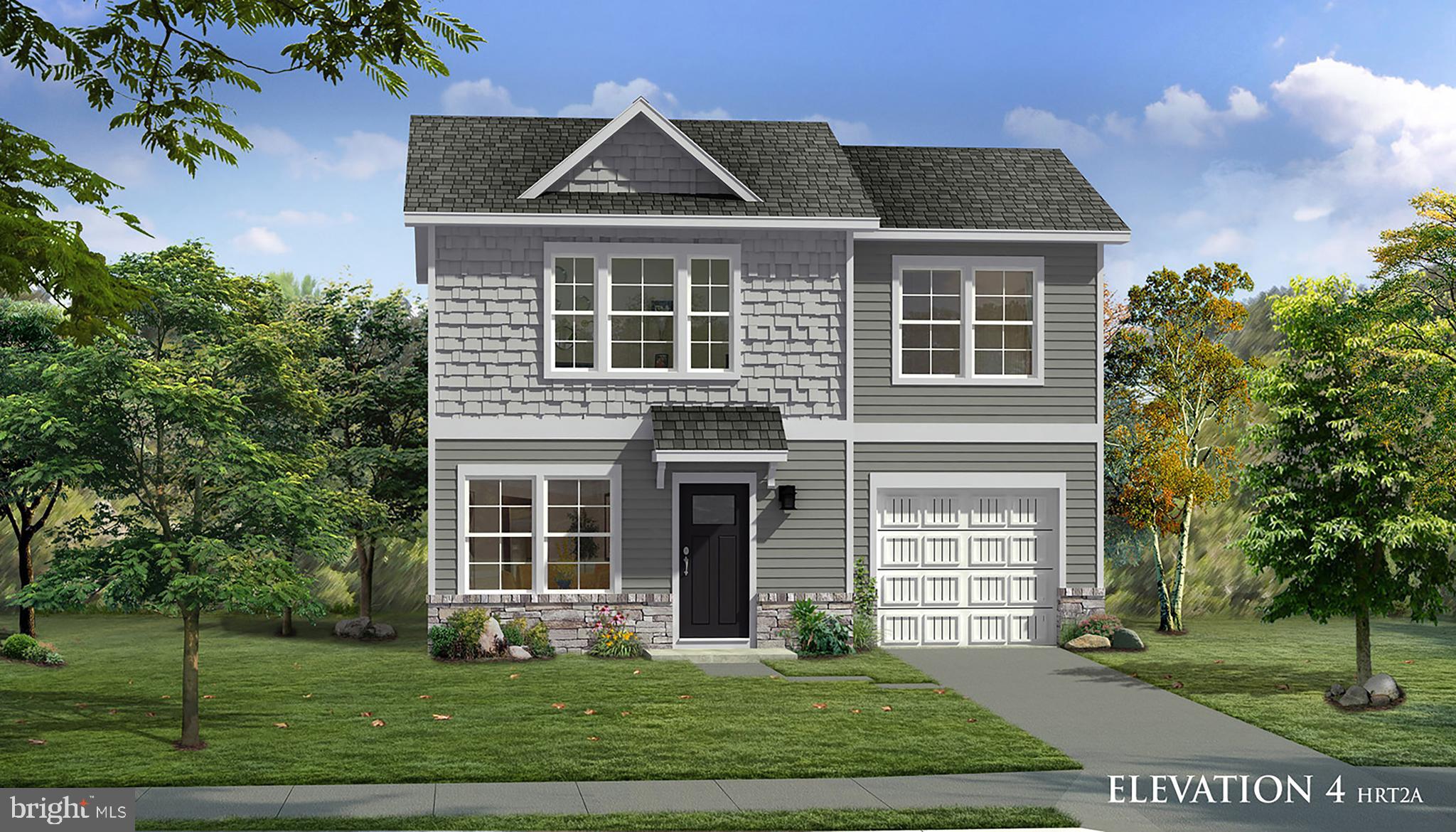 Tbb Tbb Outrigger Road, Unit WEXFORD Inwood, WV 25428 - Photo 26 of 34 a front view of a house with a yard