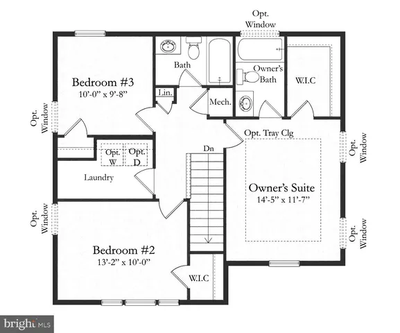 a sign on a wall next to a white house