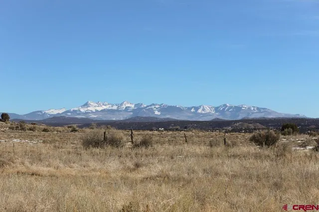 a view of mountain with sunset view