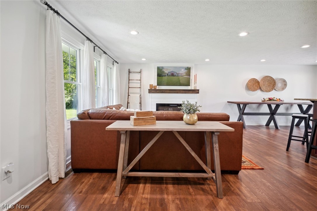 2035 Porter Road Atwater, OH 44201 - Photo 13 of 50 Living room with wood-type flooring and a textured ceiling