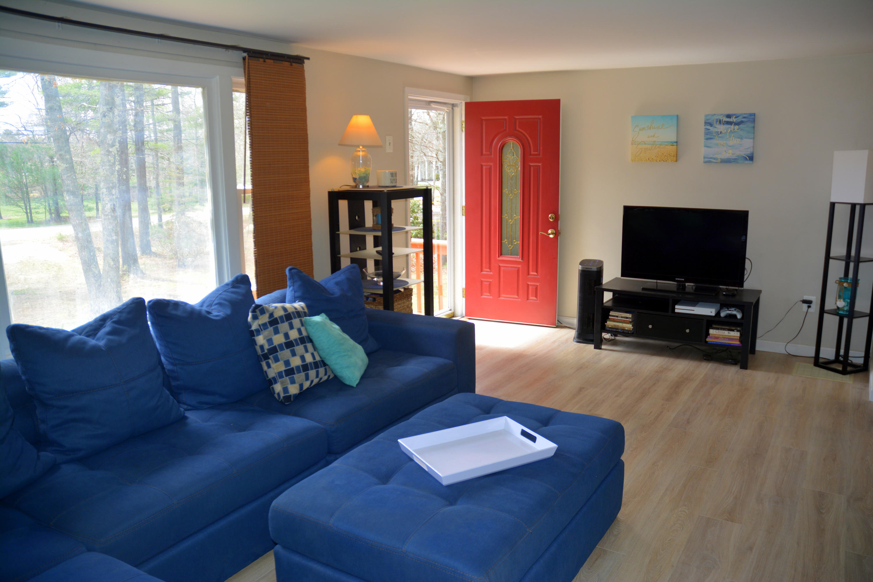 61 Papermill Road West Wareham, MA 02576 - Photo 3 of 20 a living room with furniture and a flat screen tv