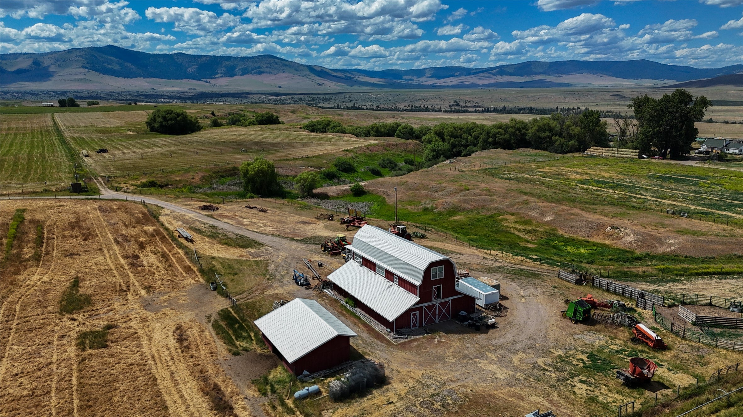 43342 Buffalo Bridge Road Polson, MT 59860 - Photo 1 of 1 Aerial view of sparsely populated area with a mountain backdrop