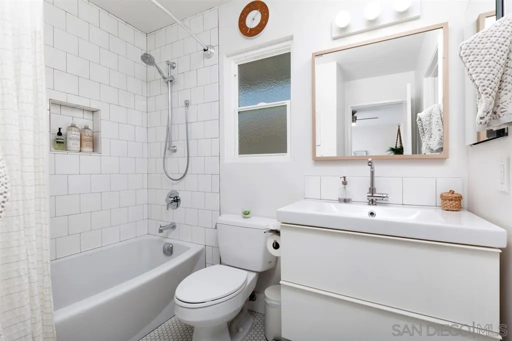 2112 Ramada Drive Oceanside, CA 92056 - Photo 13 of 25 a bathroom with a sink toilet and shower