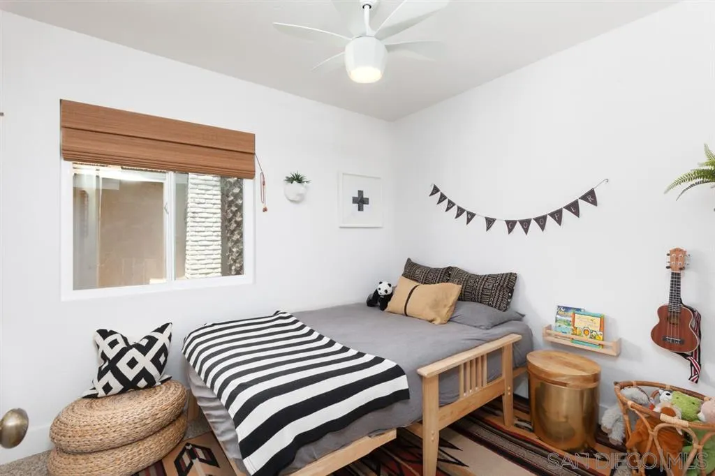 2112 Ramada Drive Oceanside, CA 92056 - Photo 14 of 25 a bedroom with a bed and window