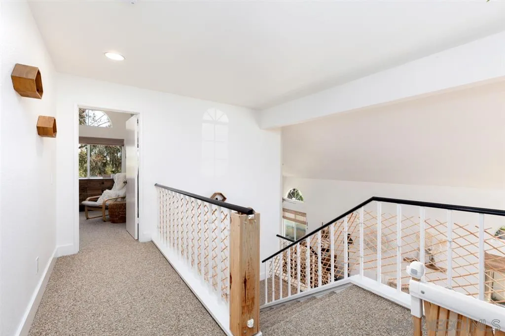 2112 Ramada Drive Oceanside, CA 92056 - Photo 15 of 25 a view of staircase with white walls and a window