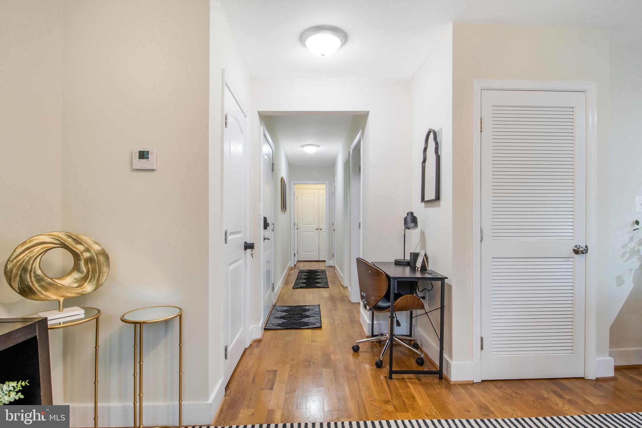 417 18th Street Northeast, Unit 101 Washington, DC 20002 - Photo 38 of 57 a view of a livingroom with furniture and front door