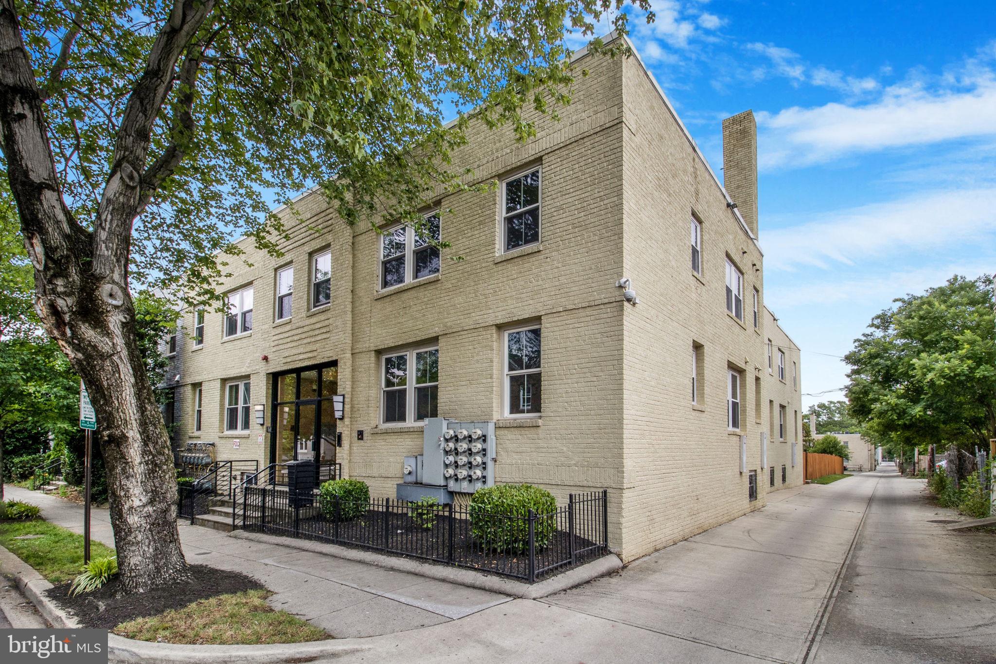 417 18th Street Northeast, Unit 101 Washington, DC 20002 - Photo 57 of 57 a front view of a house with garden