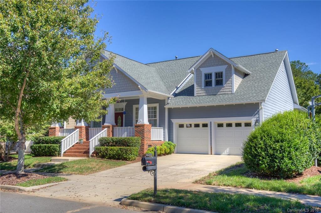 912 Gardenia Street Fort Mill, SC 29708 - Photo 1 of 32 a front view of a house with a yard and garage