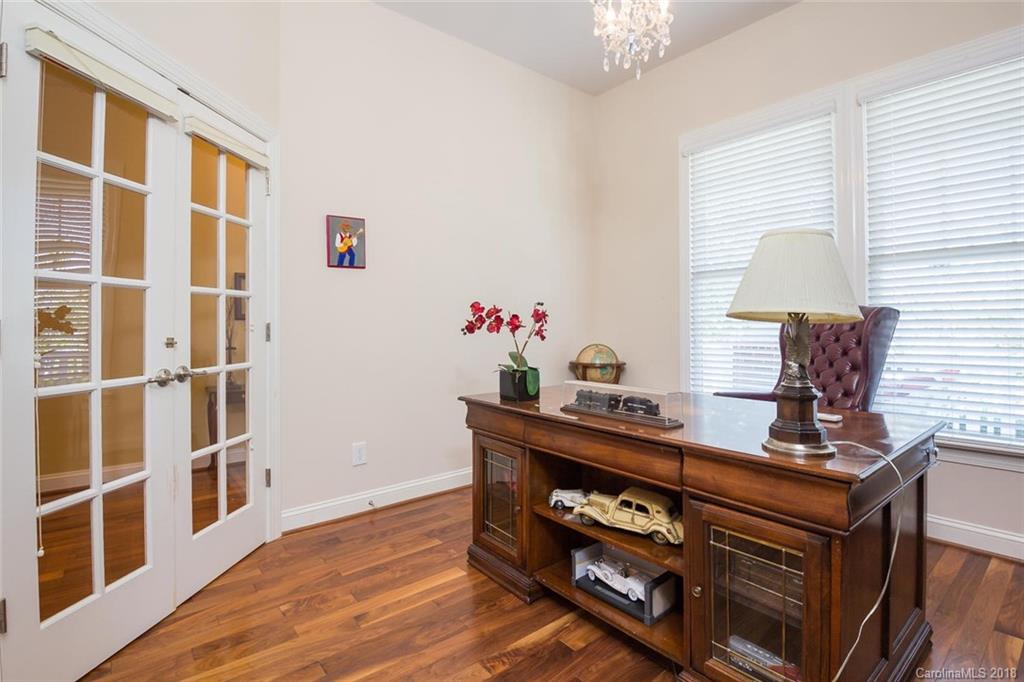 912 Gardenia Street Fort Mill, SC 29708 - Photo 19 of 32 a view of a workspace with furniture and wooden floor