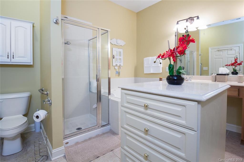 912 Gardenia Street Fort Mill, SC 29708 - Photo 25 of 32 a bathroom with a sink vanity mirror and toilet