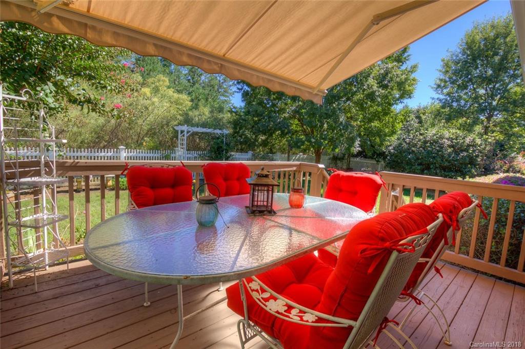 912 Gardenia Street Fort Mill, SC 29708 - Photo 6 of 32 an outdoor sitting area with red chairs