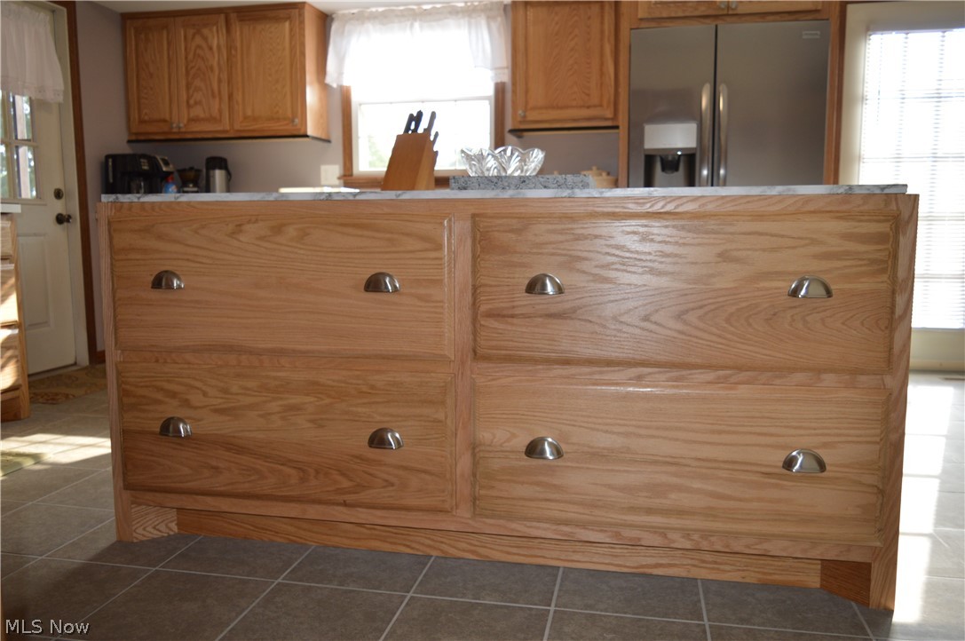 68 Haynes Road Little Hocking, OH 45742 - Photo 10 of 35 4x6 custom built by the owner solid oak island. It also has electrical outlets. These drawers are great storage and can hold 150lb per owner.