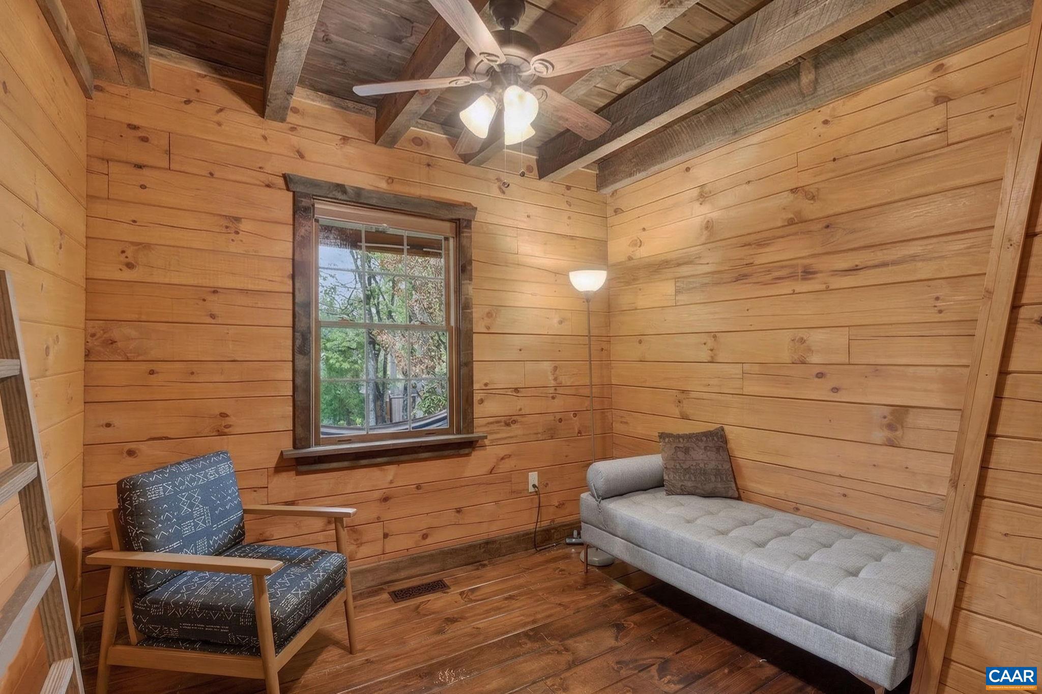 101 Greene Acres Road South Stanardsville, VA 22973 - Photo 15 of 52 a view of a door and chair in the patio