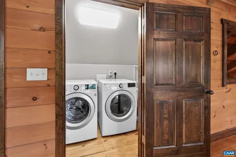 a bathroom with a toilet sink and shower