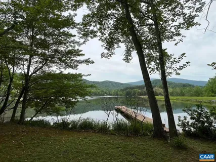 a view of a city with a lake