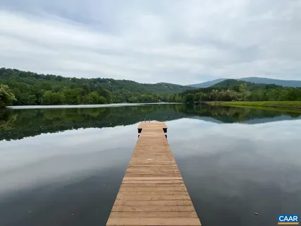 a view of a lake with a mountain in the background