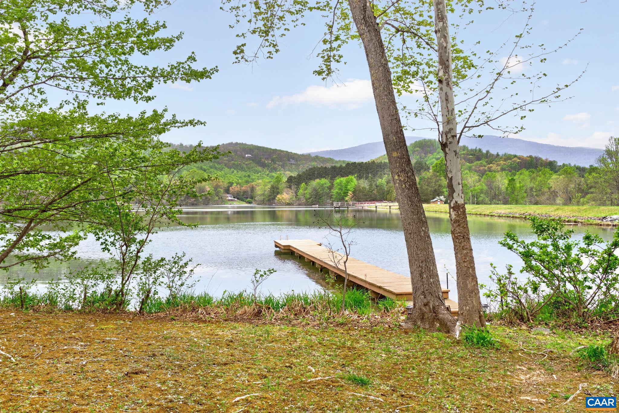 101 Greene Acres Road South Stanardsville, VA 22973 - Photo 39 of 52 a view of a lake with a mountain