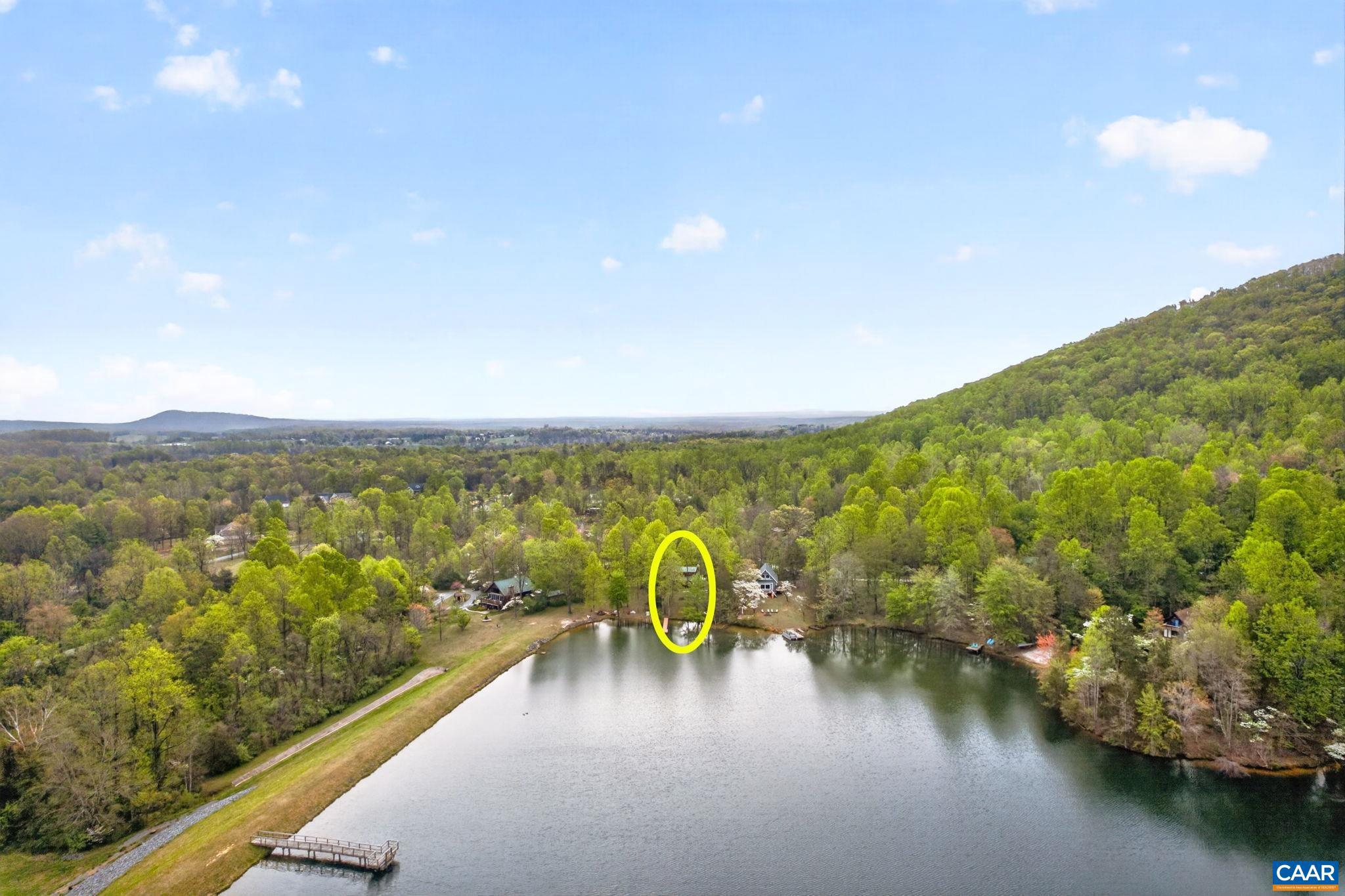 101 Greene Acres Road South Stanardsville, VA 22973 - Photo 43 of 52 a view of a lake with a mountain