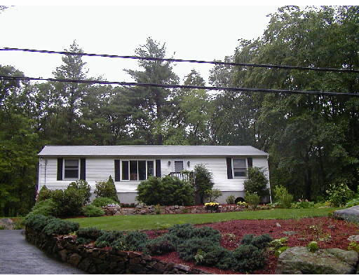 30 Spring Street Hopkinton, MA 01748 - Photo 1 of 1 a view of house with outdoor space