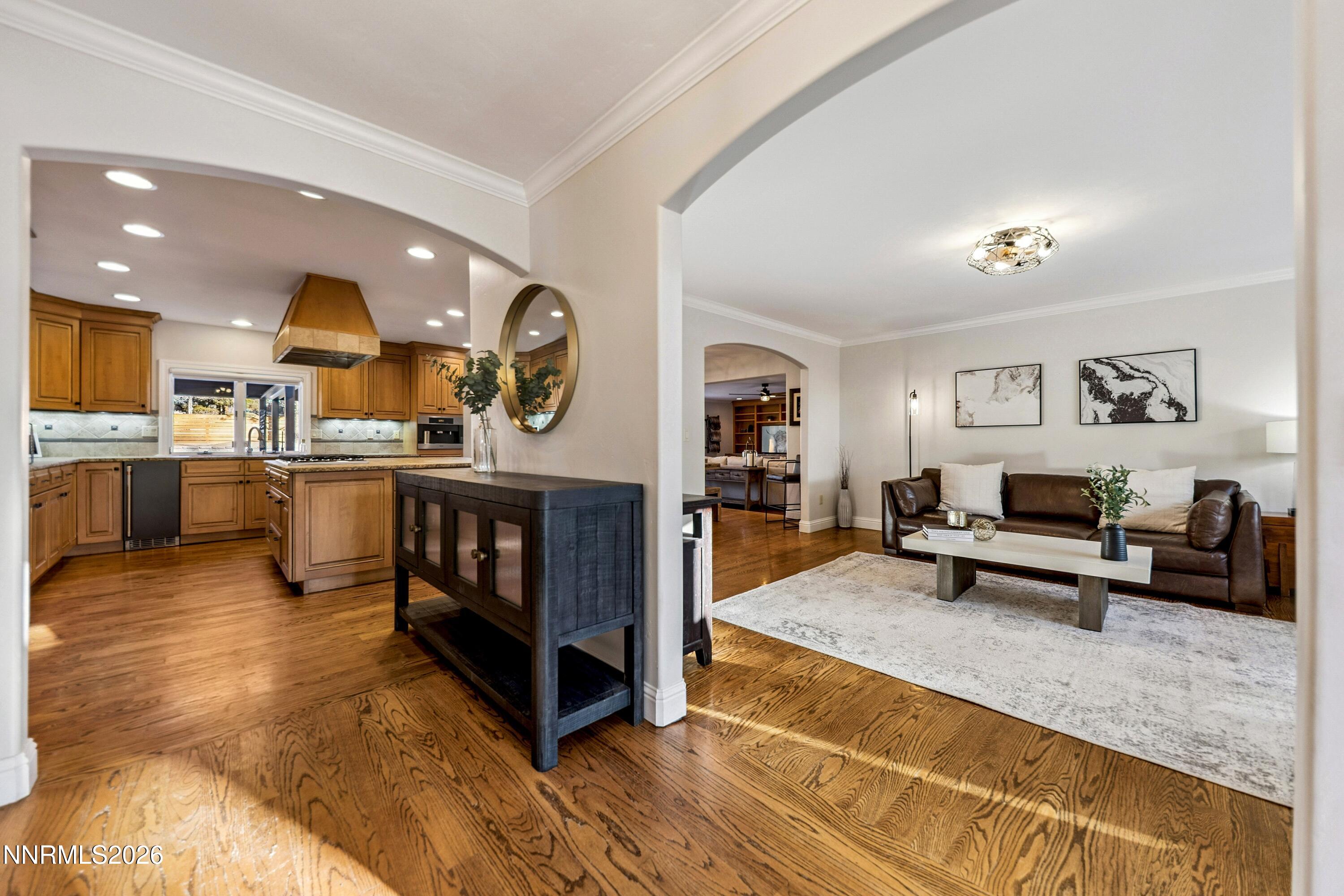 3620 East Hidden Valley Drive Reno, NV 89502 - Photo 18 of 67 a living room with stainless steel appliances kitchen island granite countertop furniture and a view of kitchen