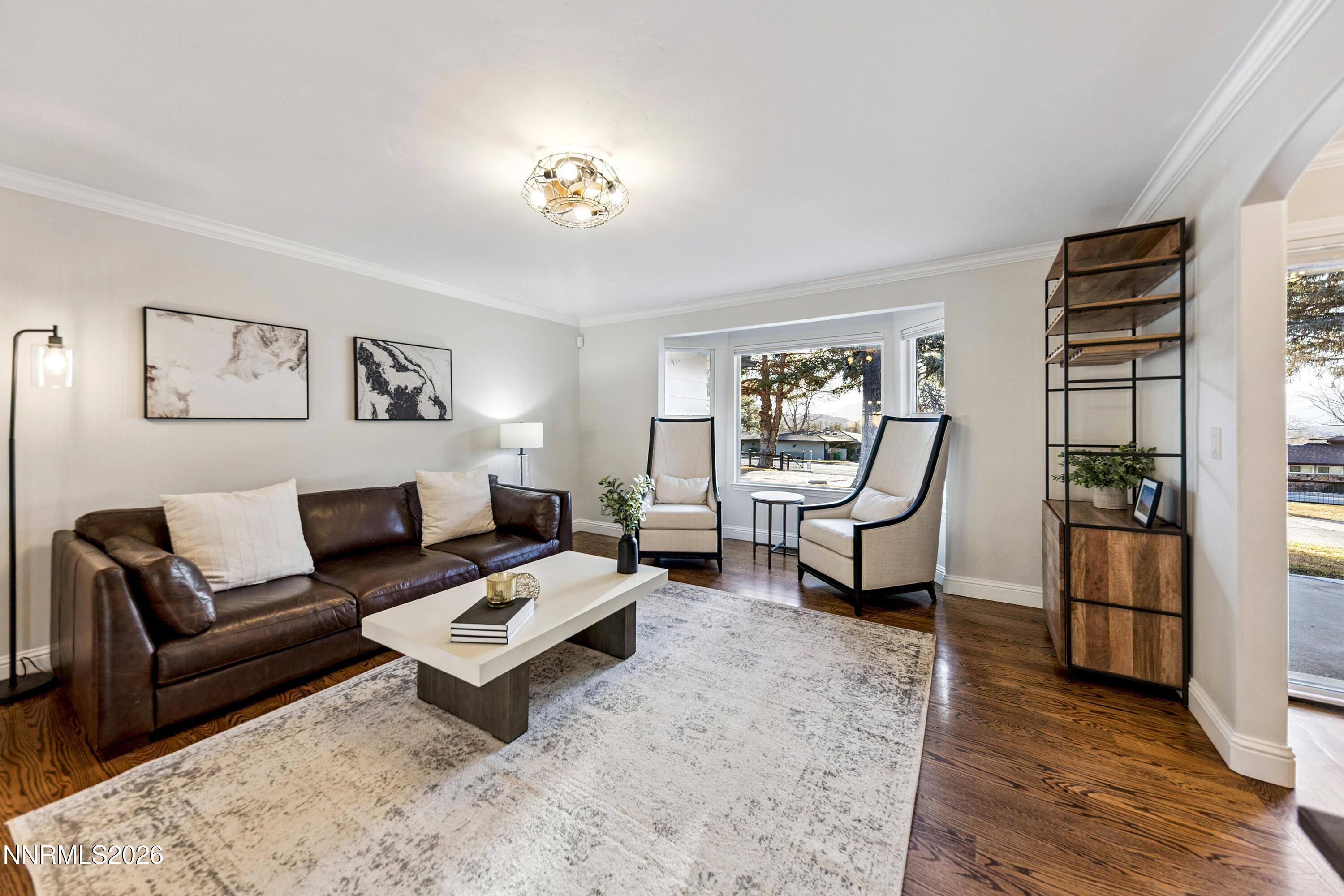 3620 East Hidden Valley Drive Reno, NV 89502 - Photo 19 of 67 a living room with furniture and a gate