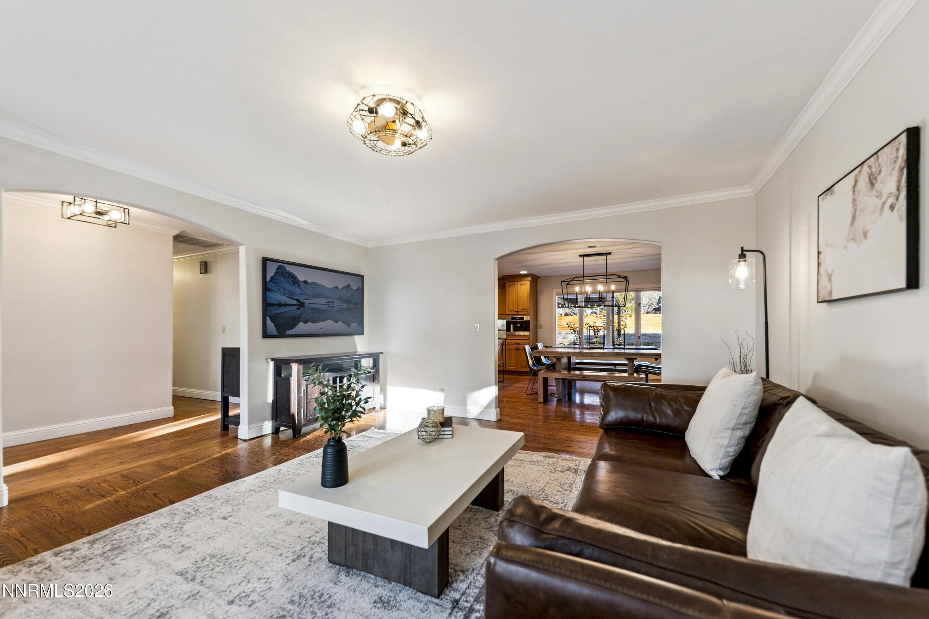 3620 East Hidden Valley Drive Reno, NV 89502 - Photo 20 of 67 a living room with furniture and a wooden floor