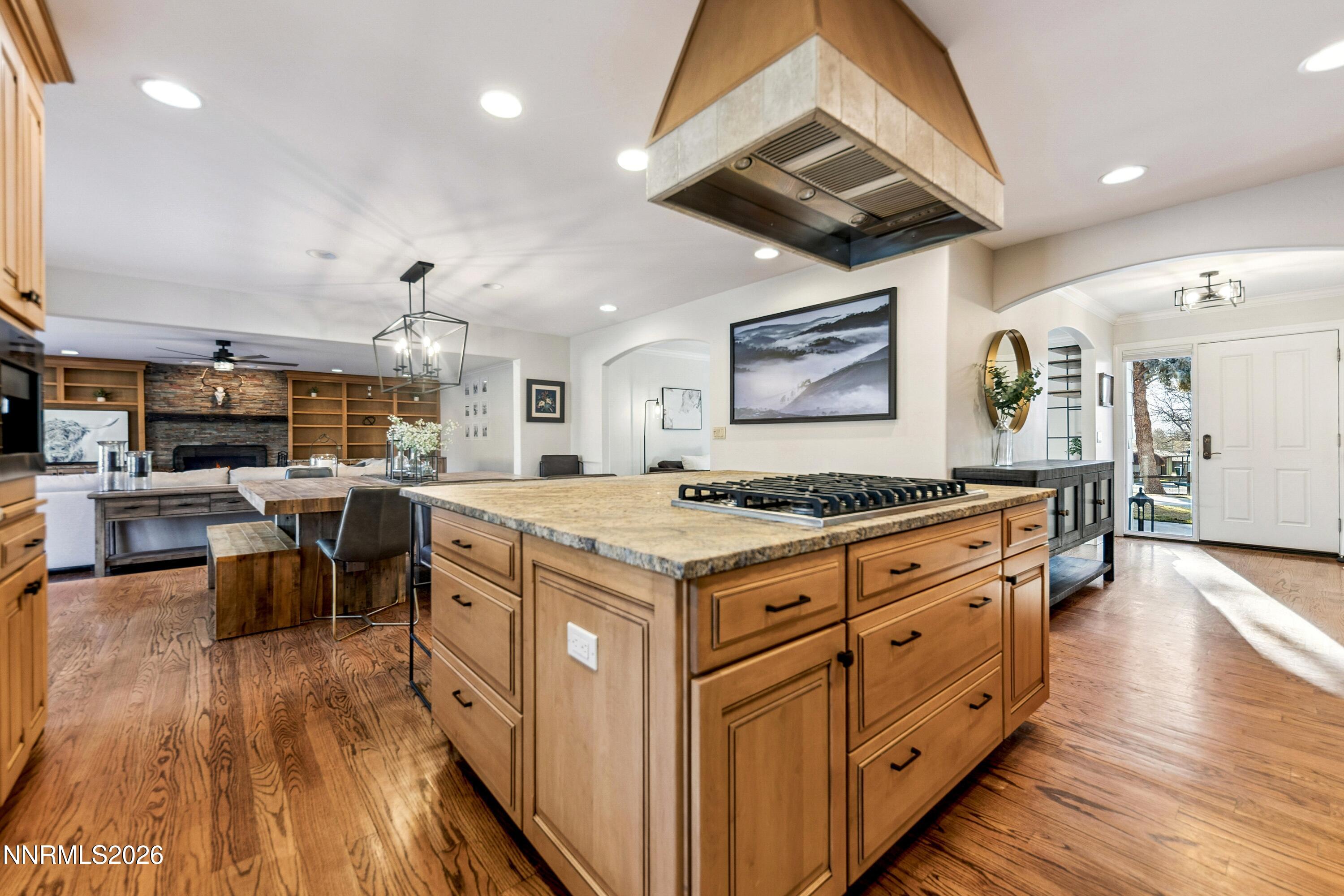 3620 East Hidden Valley Drive Reno, NV 89502 - Photo 2 of 67 a kitchen with stainless steel appliances granite countertop a stove and a wooden floors
