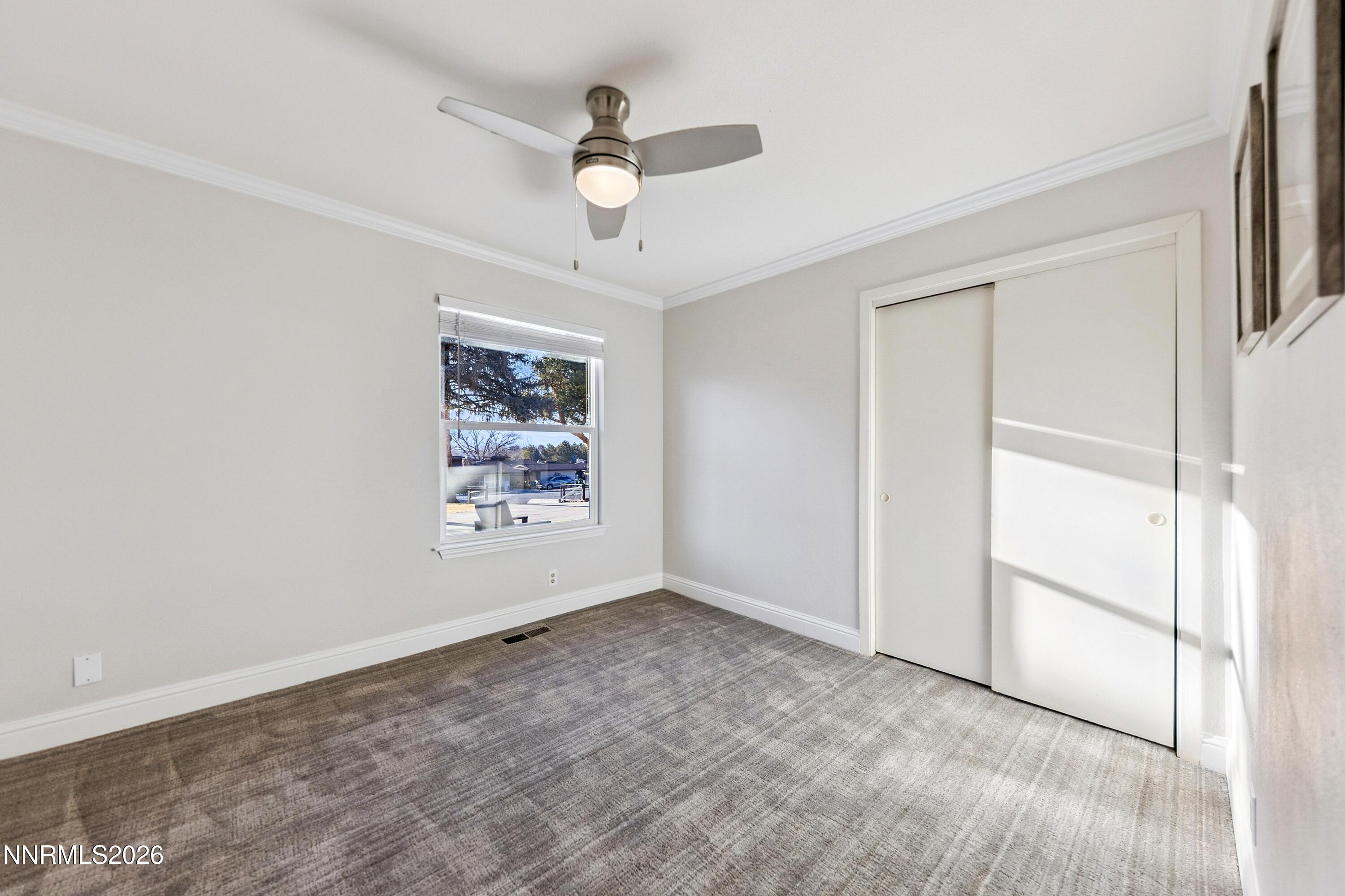 3620 East Hidden Valley Drive Reno, NV 89502 - Photo 34 of 67 an empty room with fan