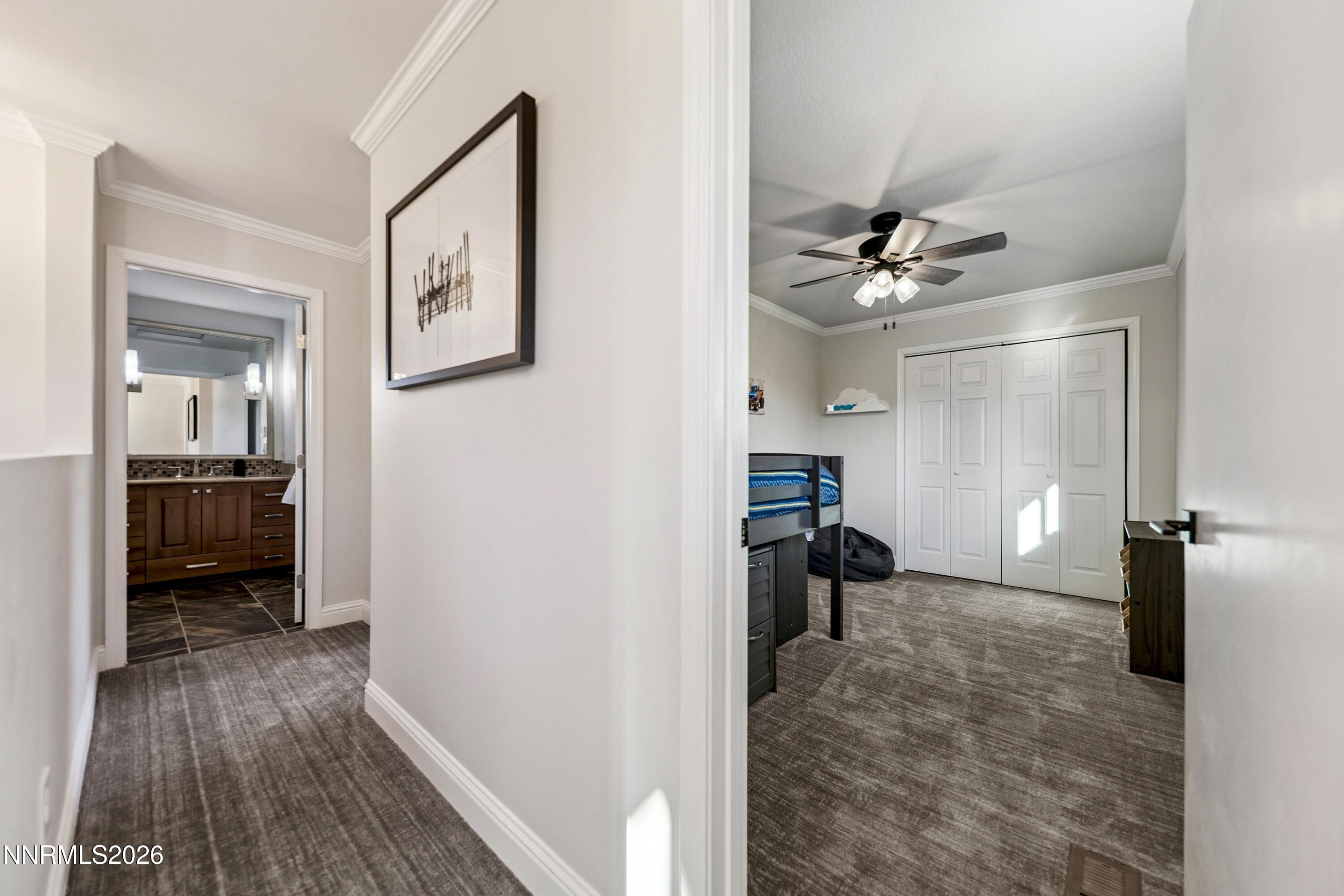 3620 East Hidden Valley Drive Reno, NV 89502 - Photo 40 of 67 a view of a room with a hanging light and hardwood floor