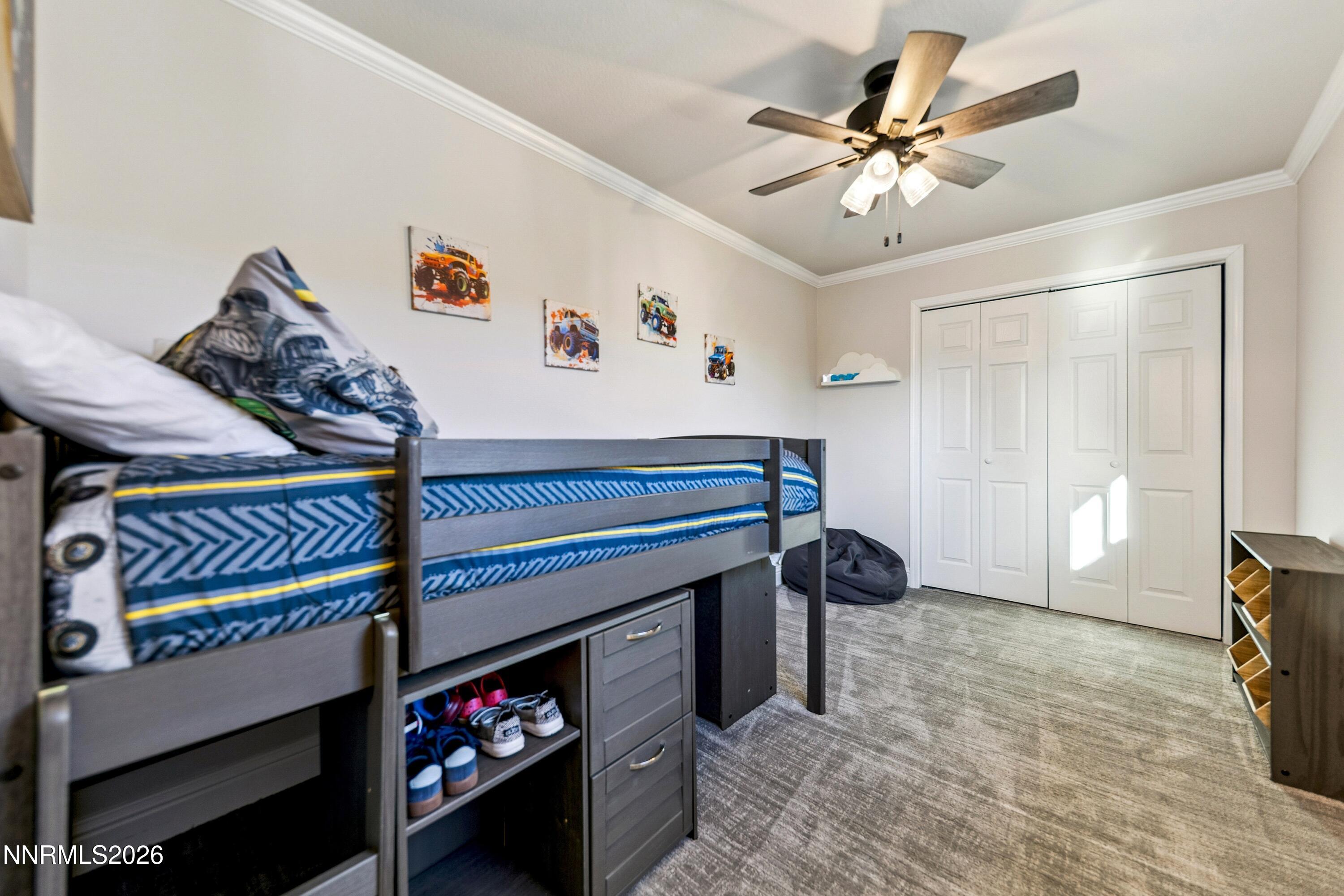 3620 East Hidden Valley Drive Reno, NV 89502 - Photo 41 of 67 a room with storage and a ceiling fan