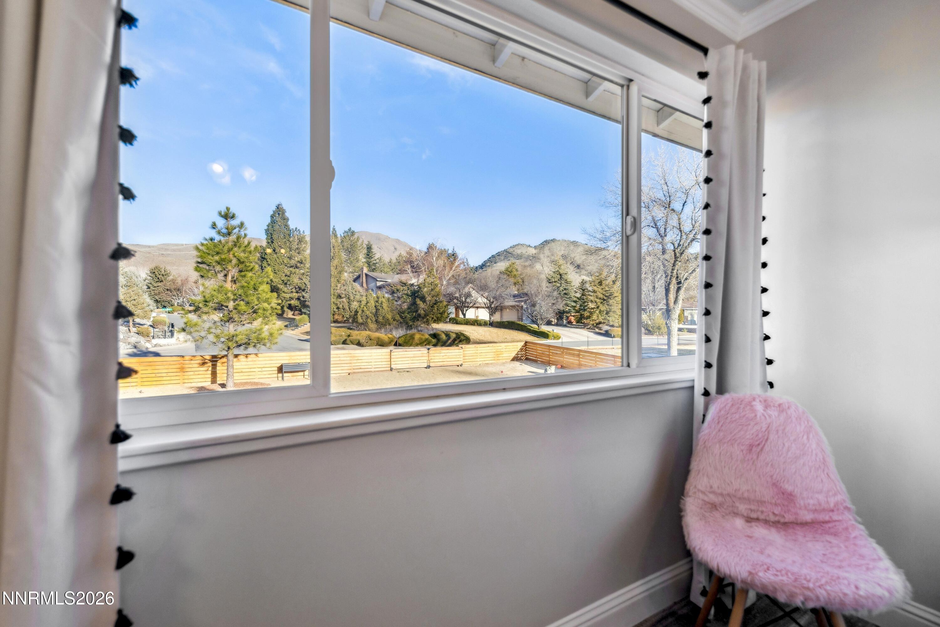 3620 East Hidden Valley Drive Reno, NV 89502 - Photo 45 of 67 a view of a room that has a bed and a window