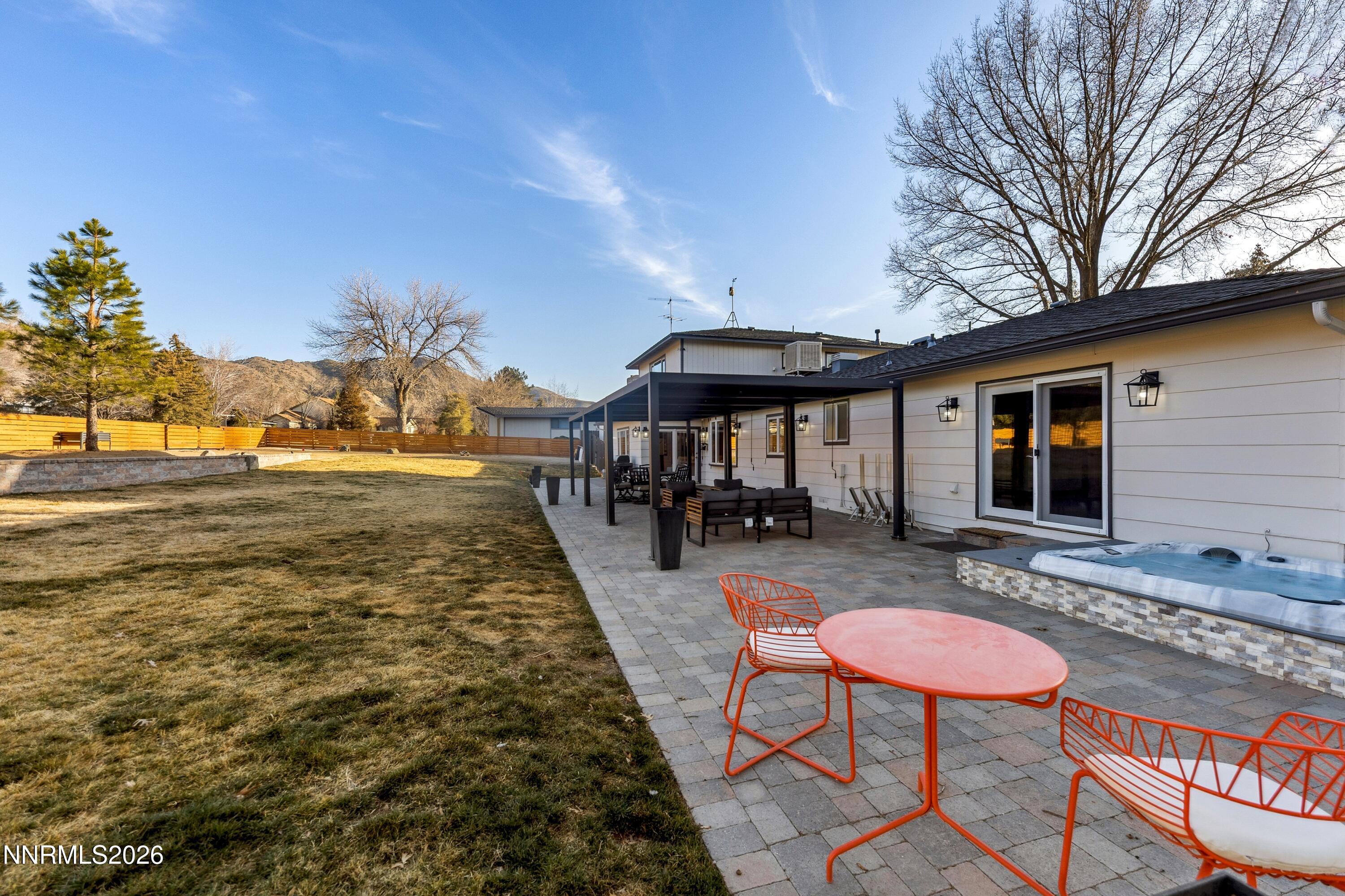 3620 East Hidden Valley Drive Reno, NV 89502 - Photo 48 of 67 a view of a swimming pool with a lounge chair