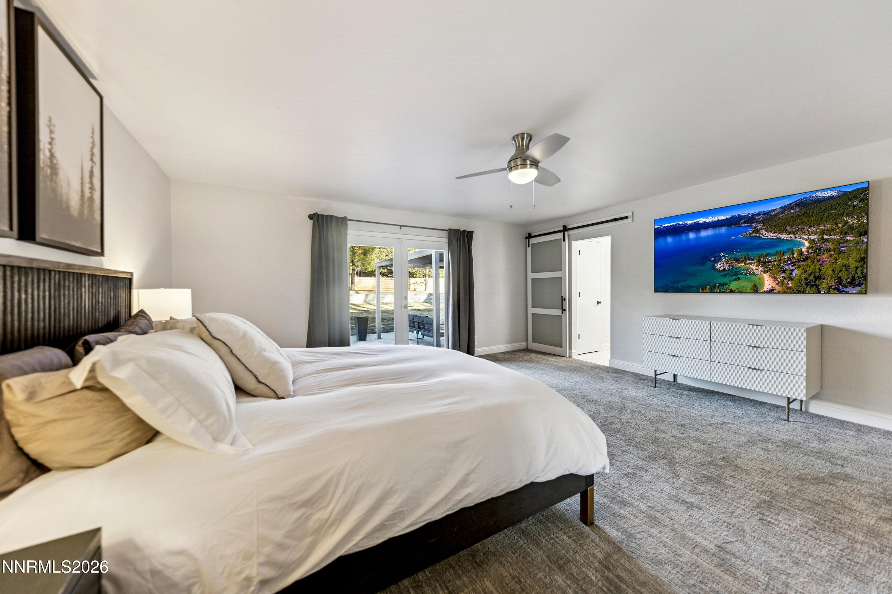 3620 East Hidden Valley Drive Reno, NV 89502 - Photo 5 of 67 a bedroom with a bed and a dresser