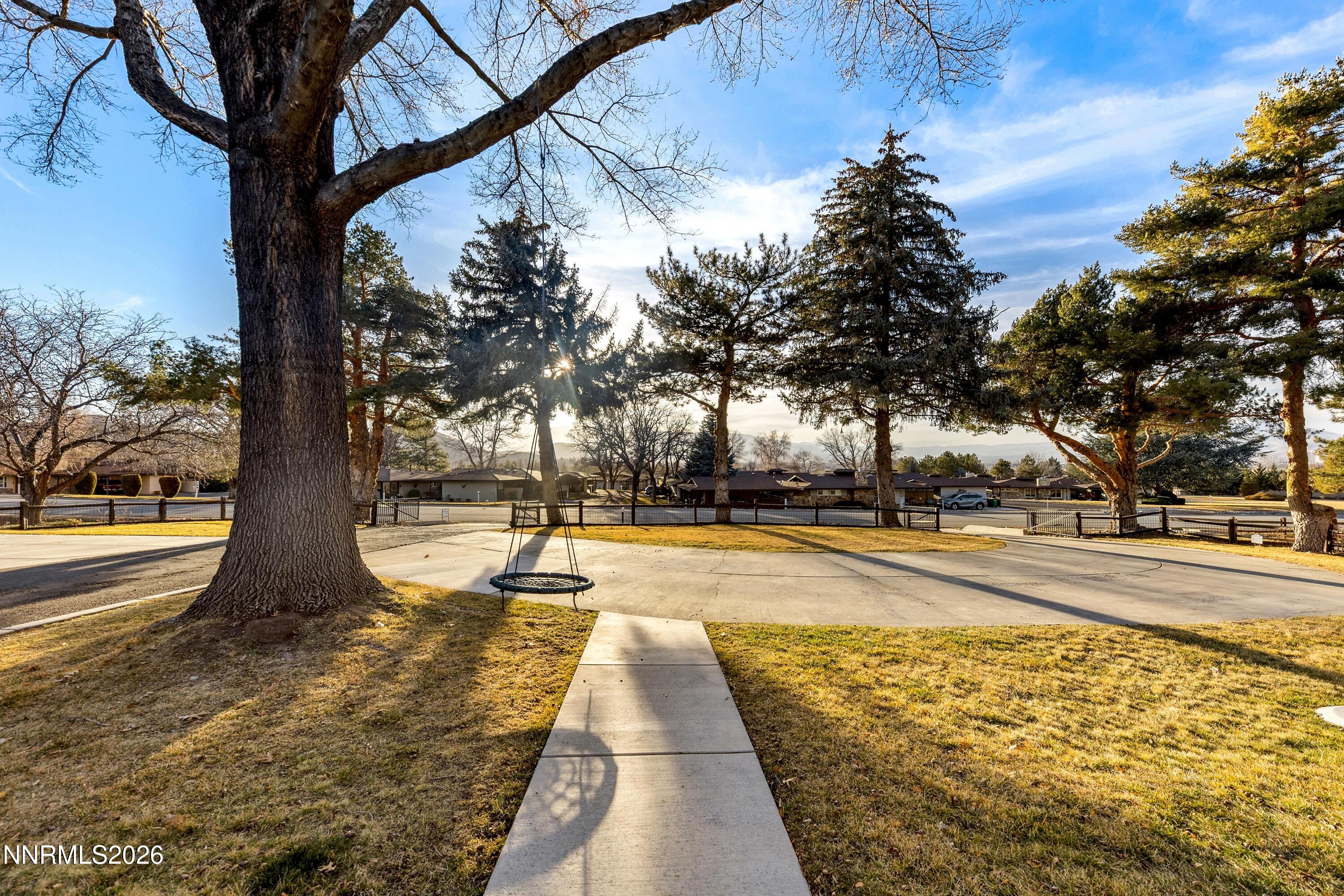 3620 East Hidden Valley Drive Reno, NV 89502 - Photo 8 of 67 a view of swimming pool with sitting area and garden