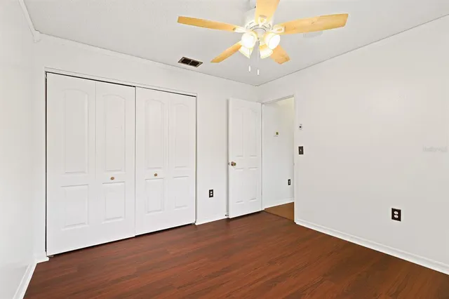 a view of an empty room with a large window