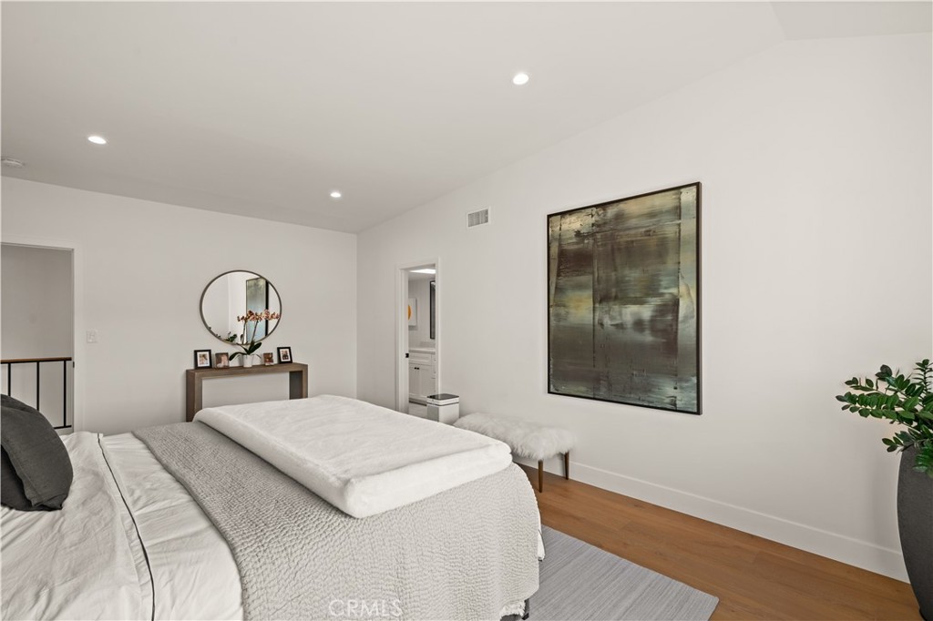 3716 Vía Dolce Marina del Rey, CA 90292 - Photo 27 of 55 a bedroom with a bed and a window