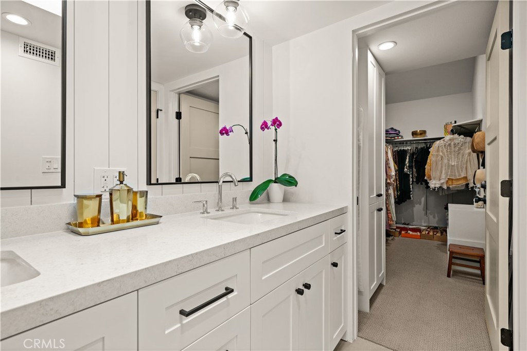 3716 Vía Dolce Marina del Rey, CA 90292 - Photo 30 of 55 a bathroom with a sink and a mirror