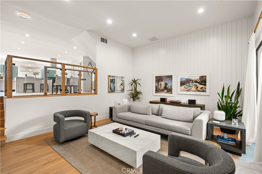 3716 Vía Dolce Marina del Rey, CA 90292 - Photo 3 of 55 a living room with furniture ceiling fan and a rug