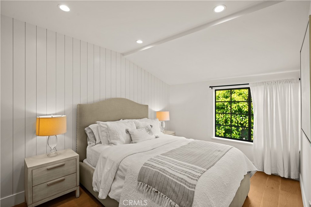 3716 Vía Dolce Marina del Rey, CA 90292 - Photo 33 of 55 a bedroom with a bed and a window