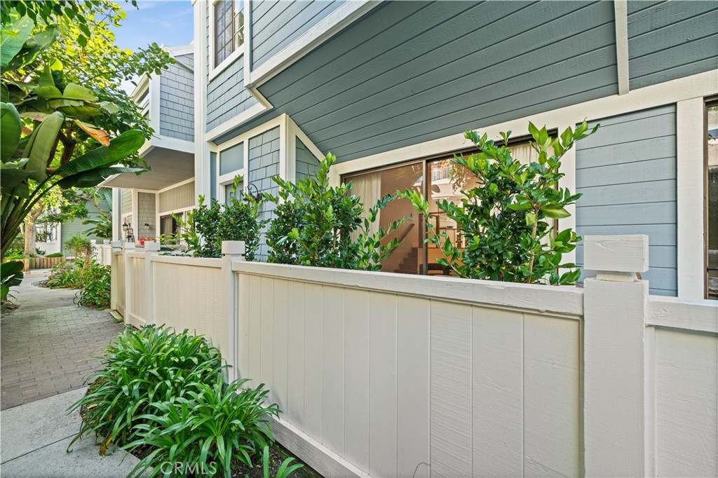 3716 Vía Dolce Marina del Rey, CA 90292 - Photo 37 of 55 a house with a flower garden