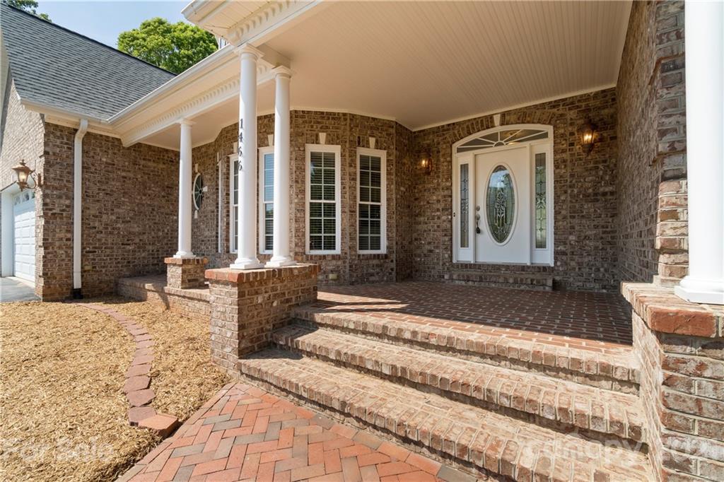 1466 Victorian Hills Circle Conover, NC 28613 - Photo 2 of 40 a front view of a house with a porch