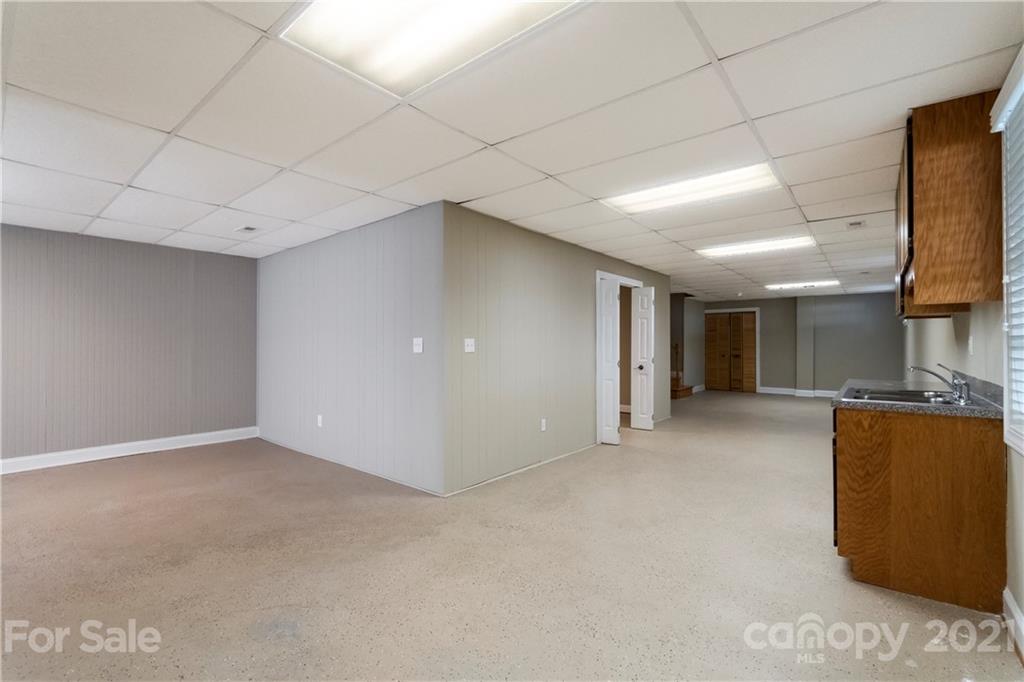 1466 Victorian Hills Circle Conover, NC 28613 - Photo 24 of 40 a view of a livingroom with a fireplace