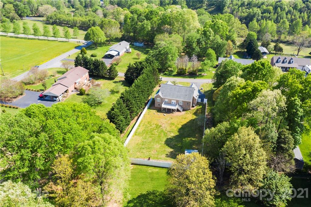 1466 Victorian Hills Circle Conover, NC 28613 - Photo 37 of 40 an aerial view of a house with swimming pool outdoor seating and yard